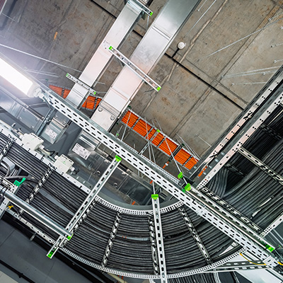 Structured copper and fibre cabling installation in a commercial setting.
